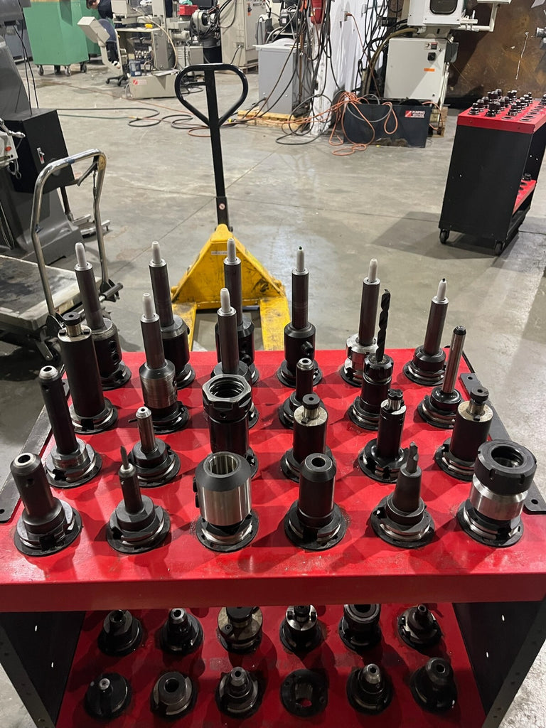 144 Count Cat 40 Taper Tool Holders with pull studs w/2 Huot Tool Towers